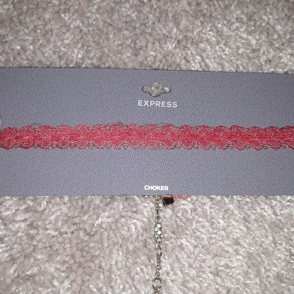 Never worn. Beautiful coral pink lace choker